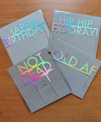 Holographic birthday cake toppers