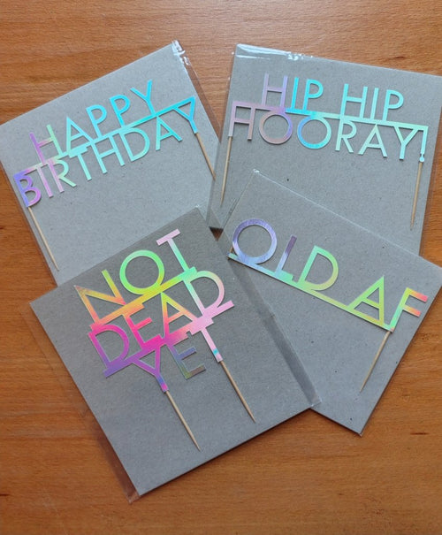 Holographic birthday cake toppers