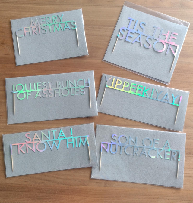 Selection of holographic Christmas cake toppers