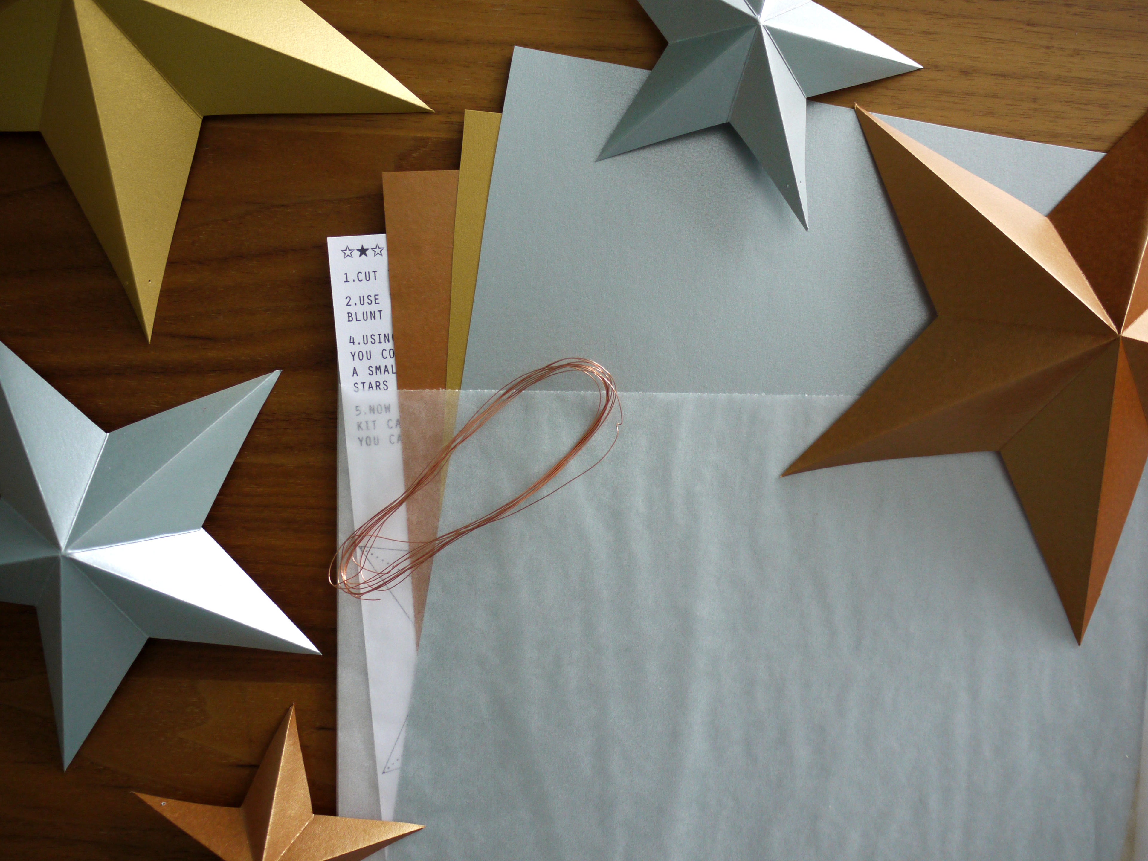 Flatlay contents of DIY star garland kit