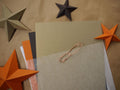 Star-shaped decorations on a paper surface