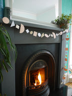 Modern multi shape paper garland in Paper Street Doll's DELYSIA colours of peach, cream and lilac