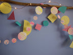 Driftwood wall hanging of Paper Street Doll's LORELAI paper garlands  with fairy lights