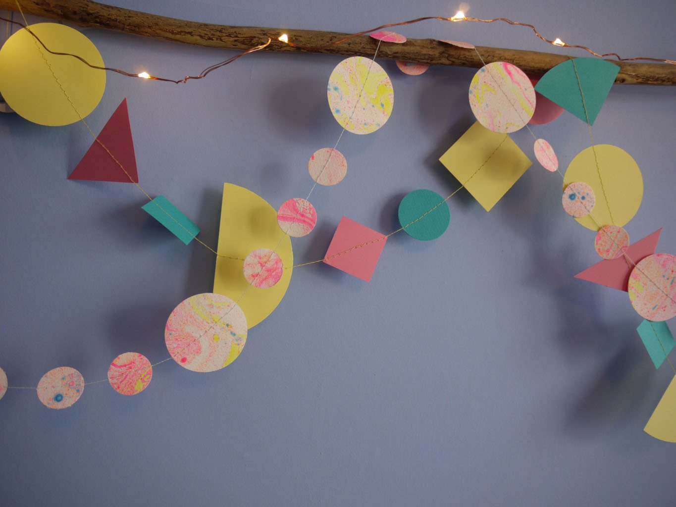 Driftwood wall hanging of Paper Street Doll's LORELAI paper garlands  with fairy lights
