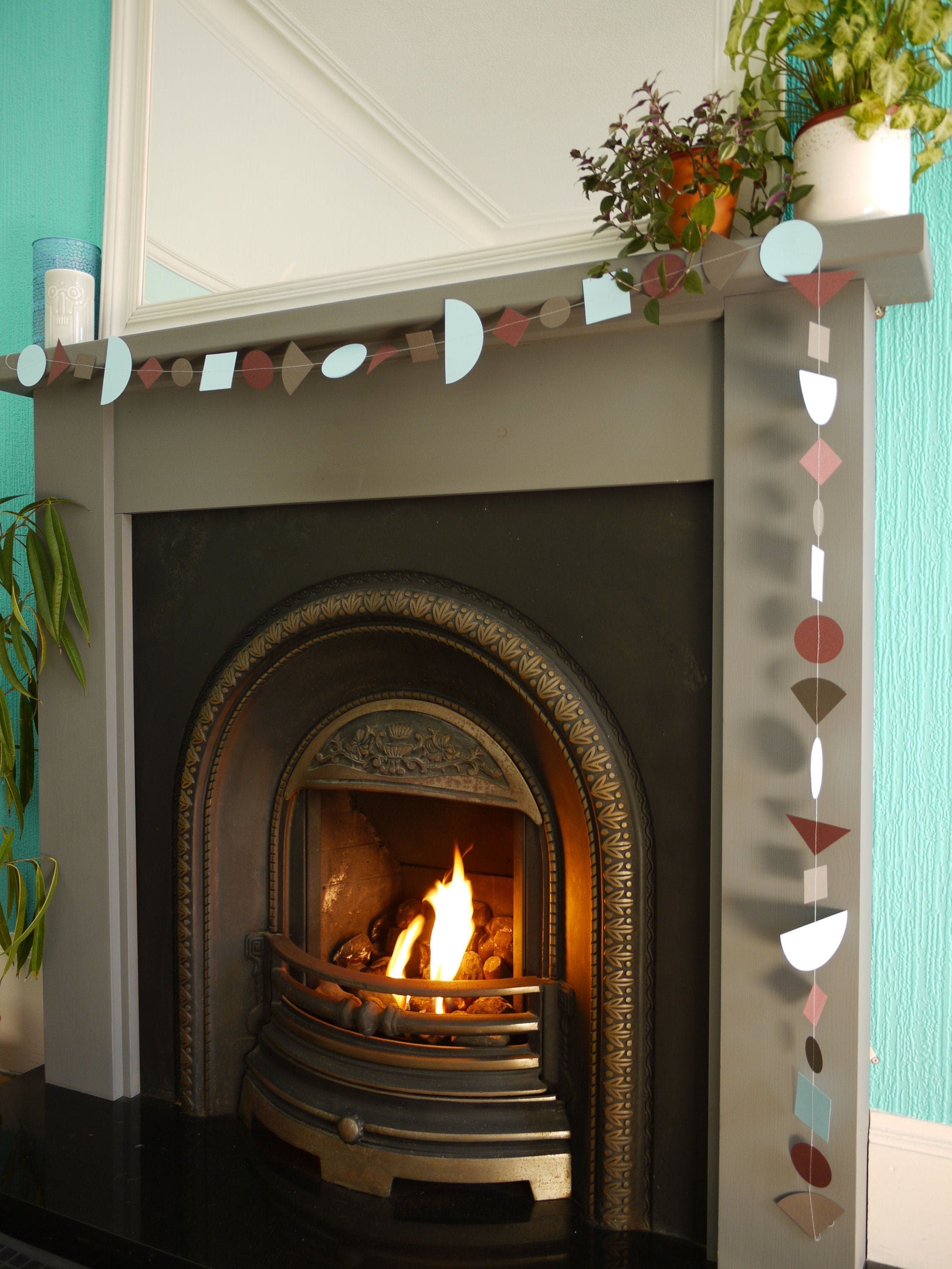 Modern multi shape paper garland in Paper Street Doll's RAGNAR colours of sky blue, charcoal and rust