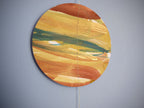 Circular abstract painting of Jupiter as part of  solar system wall hanging.