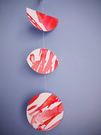 Pink and red moon phases paper garland 