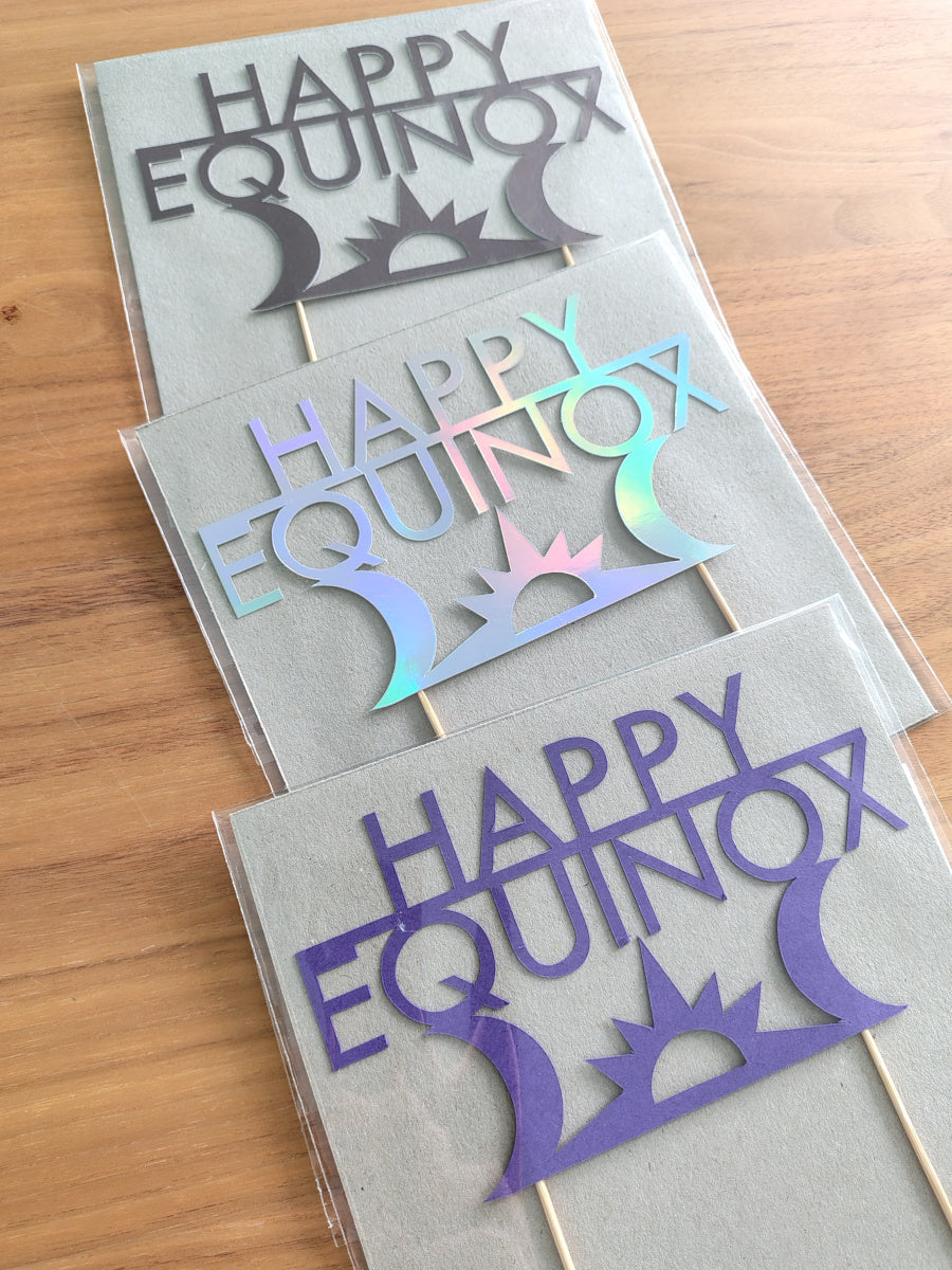 Selection of Happy Equinox cake toppers