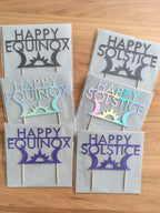 Selection of Happy Solstice and Happy Equinox cake toppers