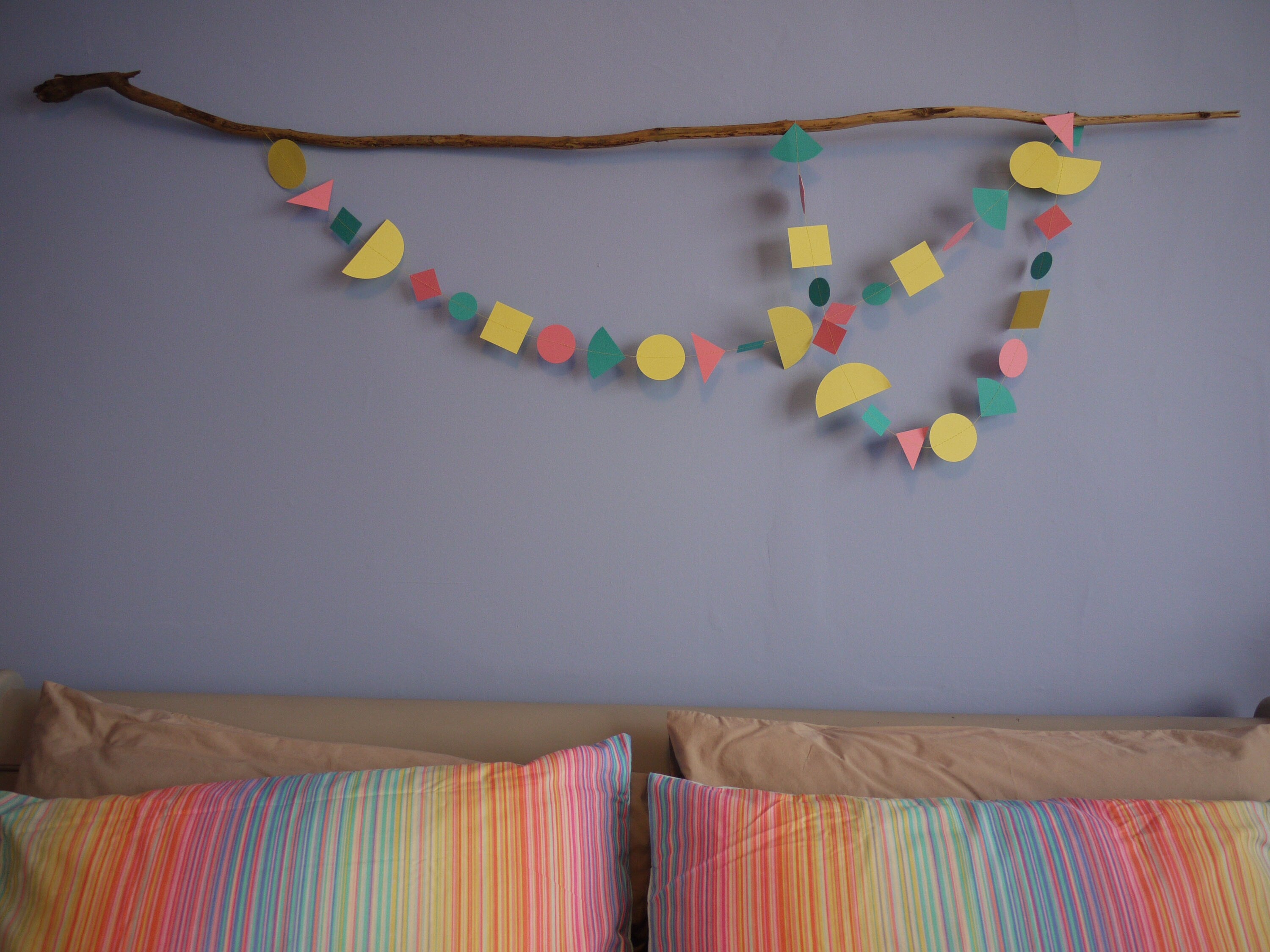 Modern multi shape paper garland in Paper Street Doll's LORELAI colours of aqua, lemon yellow and rose