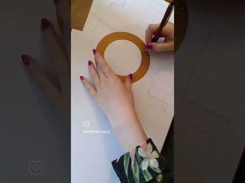 The process of Paper Street Dolls drawing out  letters to create custom letter banners